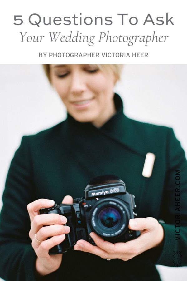 Image of Victoria Heer, luxury wedding photographer, holding a camera. Image overlaid with text that reads 5 Questions to Ask Your Wedding Photographer by Photographer Victoria Heer.